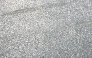 Sexhow laminate fibreglass or shingles?